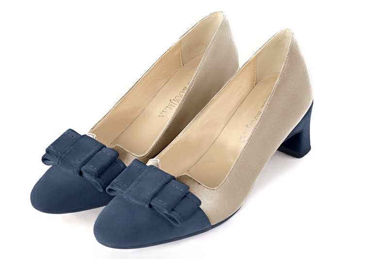 Denim blue and gold women's dress pumps, with a knot on the front. Round toe. Low kitten heels. Front view - Florence KOOIJMAN